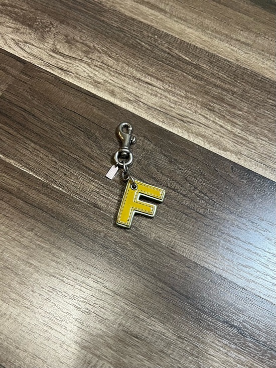 Coach Handbags - Coach bag charm Yellow and purple Letter F Keychain Charm